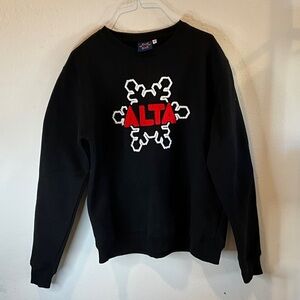 Black Sweater with Red Snowflake Design
